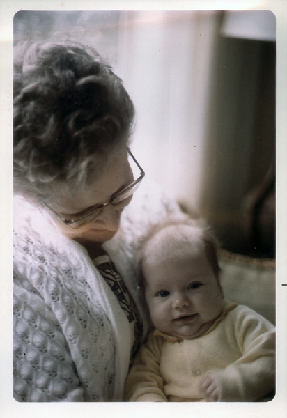 grandma & baby.jpg - I choose to believe this is me. Worst case scenario is I'm wrong and it's Jeff, and I guess that's alright. I keep this picture in a beat-up silver frame that seems to suit it.